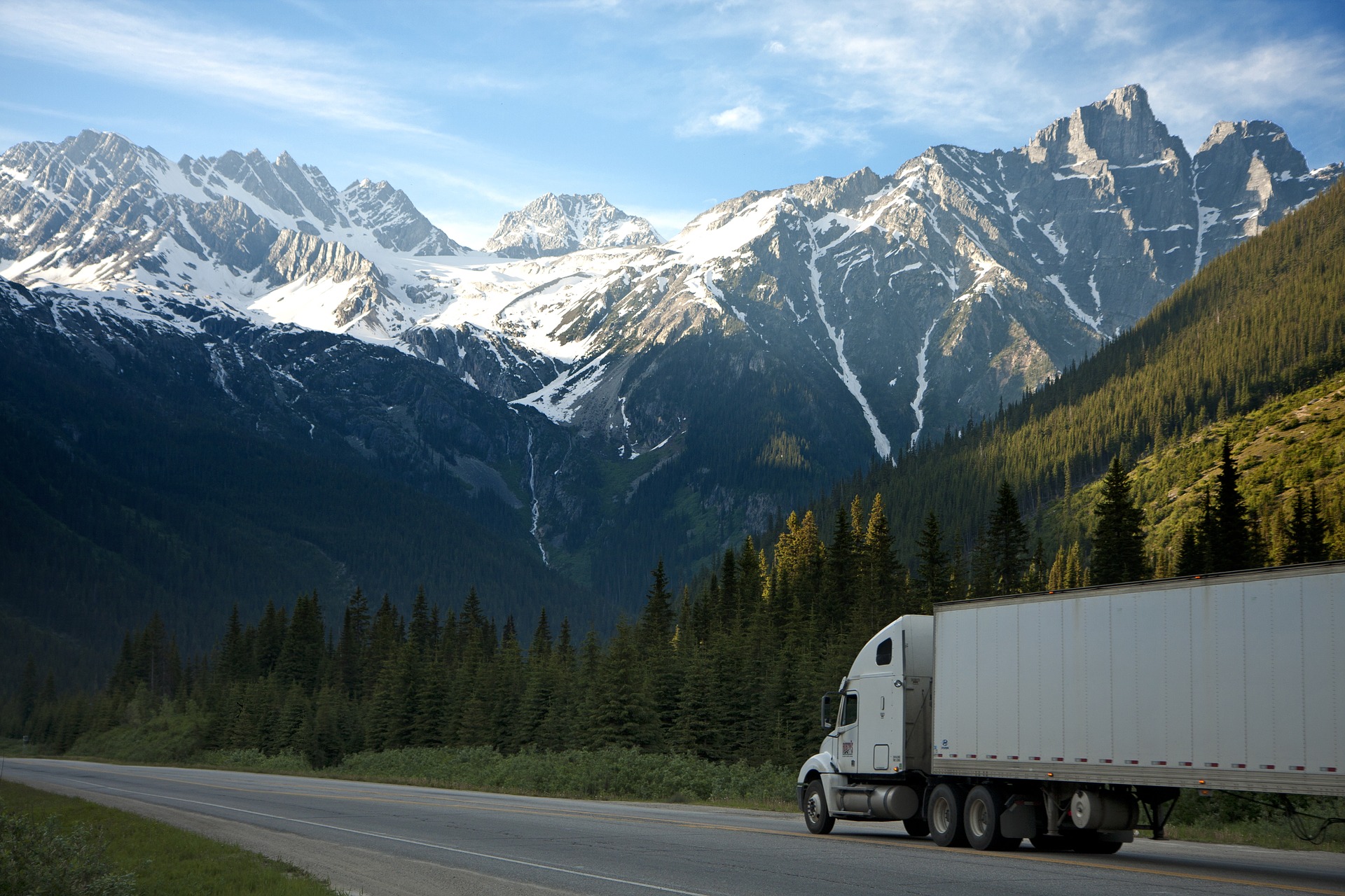 moving truck with mountains in the background